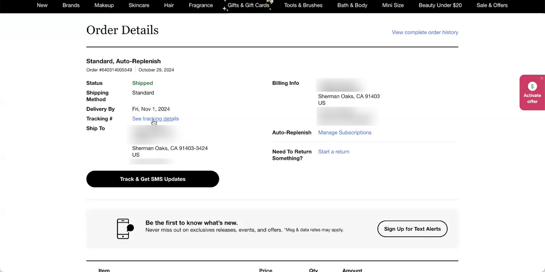 Order details page with mouse hovering a tracking details link on ecommerce desktop site.