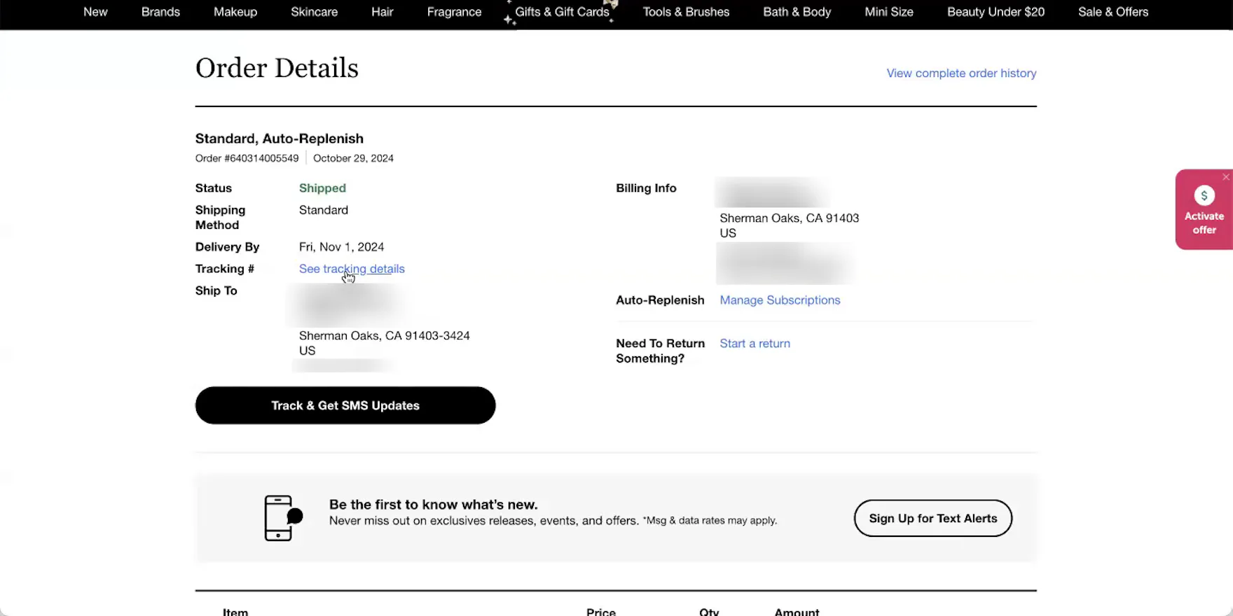 Order details page with mouse hovering a tracking details link on ecommerce desktop site.