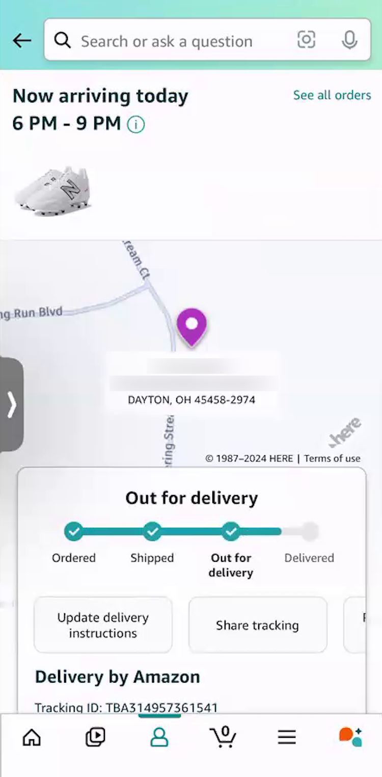 Amazon mobile app “Order Tracking” page with order-tracking details and progress in a box on top of map view with pin.