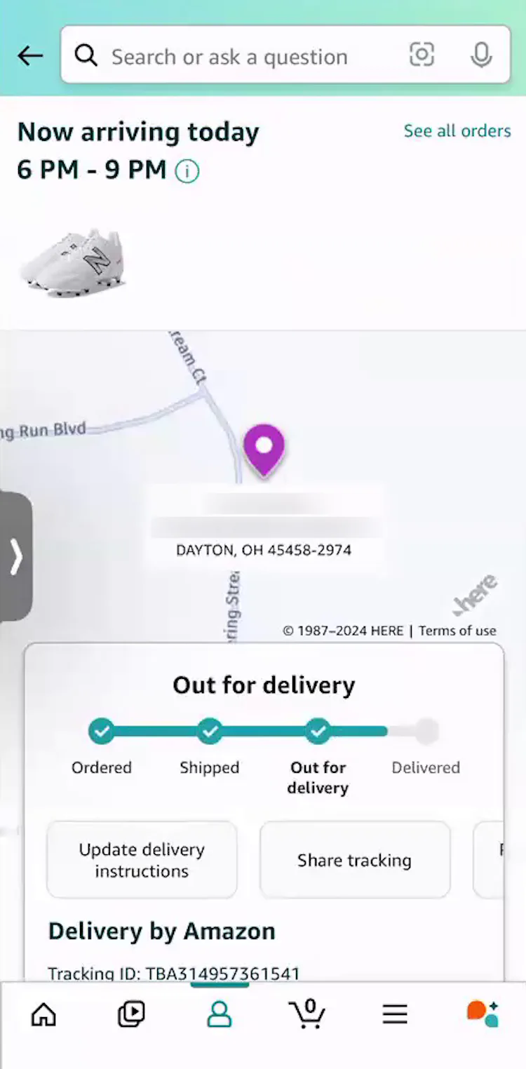 Amazon mobile app “Order Tracking” page with order-tracking details and progress in a box on top of map view with pin.