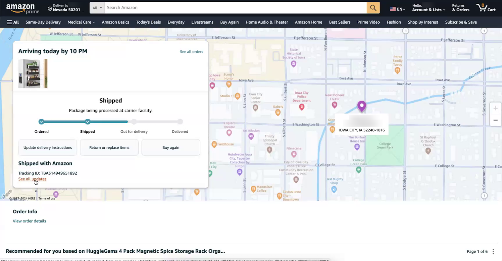 Amazon desktop “Order Tracking” page with order-tracking details including a link to “See all updates” next to a map with pin.
